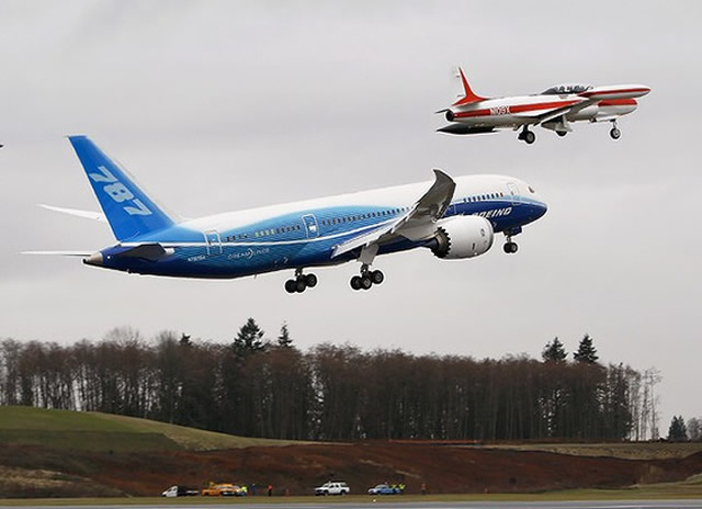 787 takes off with chase planes on its first flight