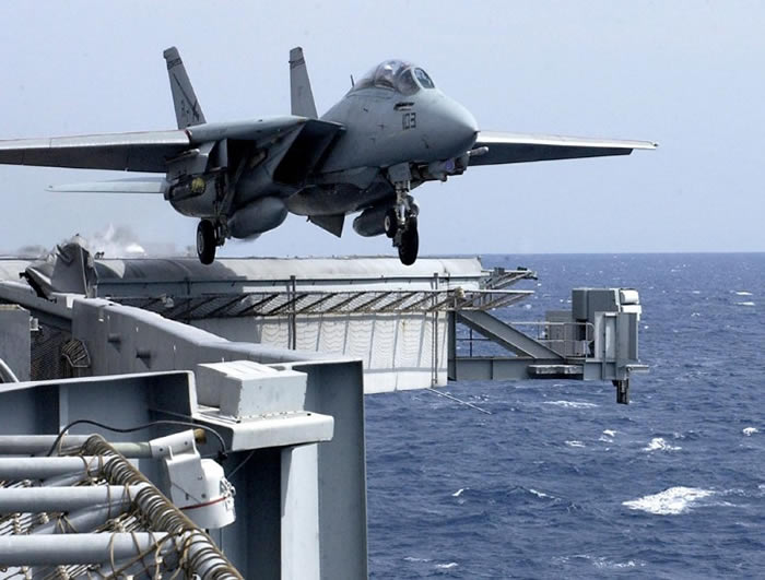 f-14 tomcat takes off from harry s truman aircraft carrier