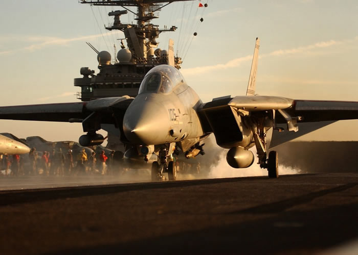 f14 tomcat takes off from aircraft carrier