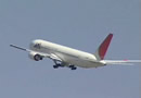 airliners taking off from an airport in japan