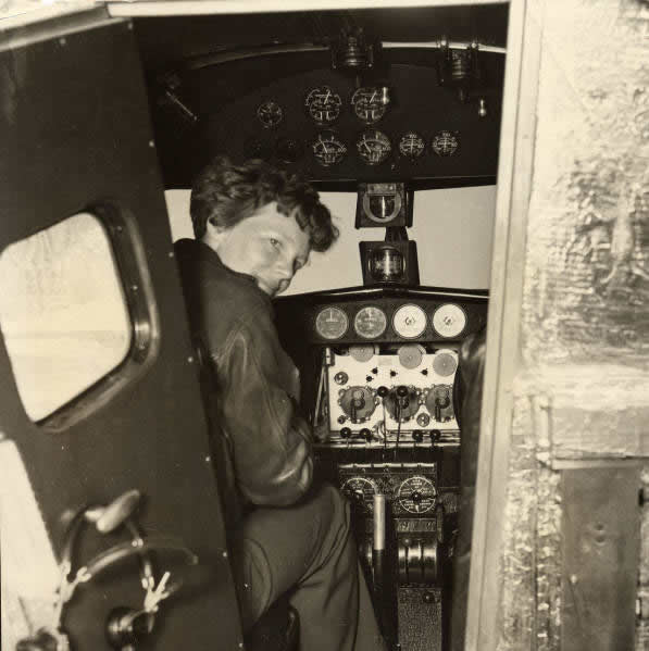 Amelia Earhart in the cockpit of her Lockheed L-10 Airplane