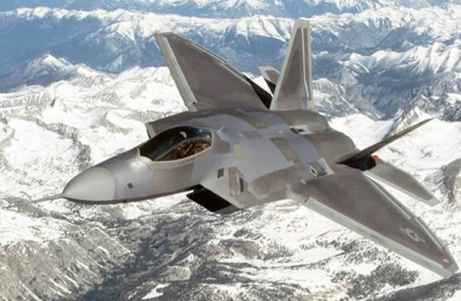 F22 flying over mountains