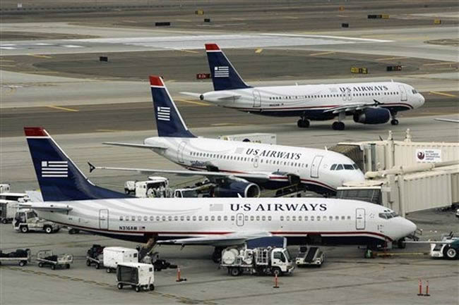 us airways aircraft at airport gate - boeing 737 and airbus a320