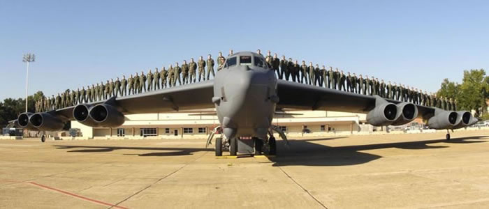 B-52 with pilots standing on wings