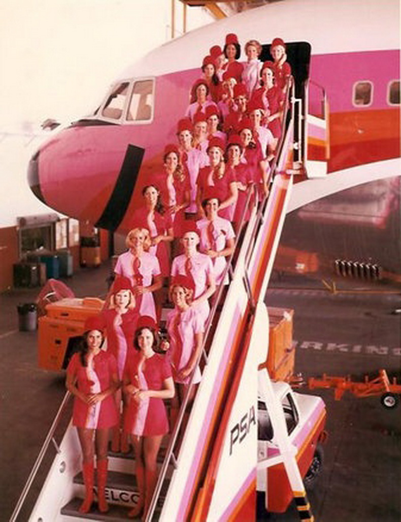 flight attendants from psa airlines standing on air stairs of L-1011
