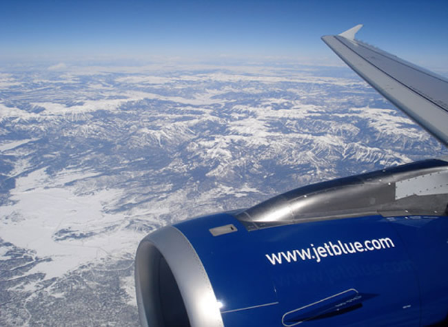 Looking out the window flying in a Jetblue A320 Aircraft