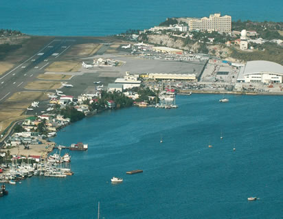 runway and terminal at princess juliana airport